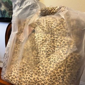 Beis Elsa wild child leopard diaper backpack